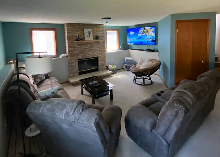 Living room w/ fireplace and 65” Smart TV with complimentary streaming accounts for guests to kick back and relax! 
Located on same level as Rushmore room. 
Two queen size air mattresses available to use in this area as well. 