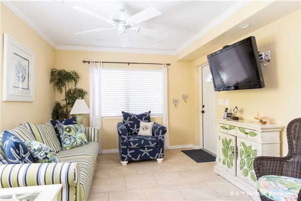 Living room with queen sofa bed and flat panel TV