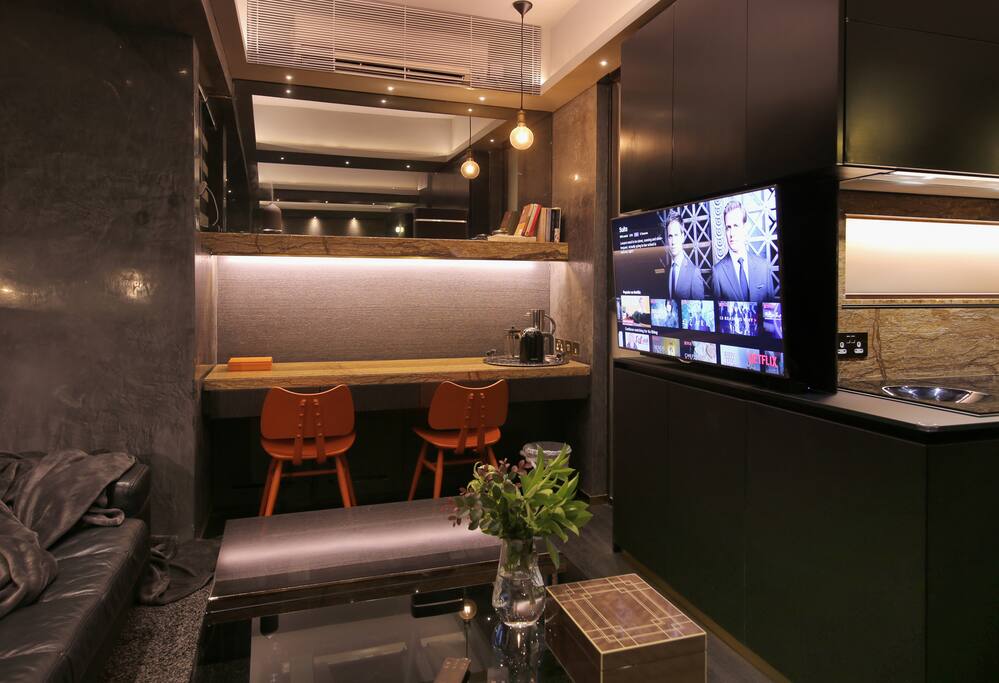 The coffee table extends and lifts to become a full sized dining table