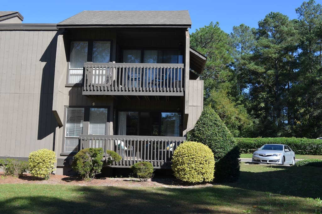 Convenient parking and the deck looks onto the golf course.