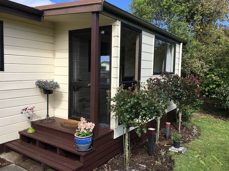 Serendipity Cottage. Nestled in native trees. Wake up to bird song. Short stroll to New Zealand’s largest lake.