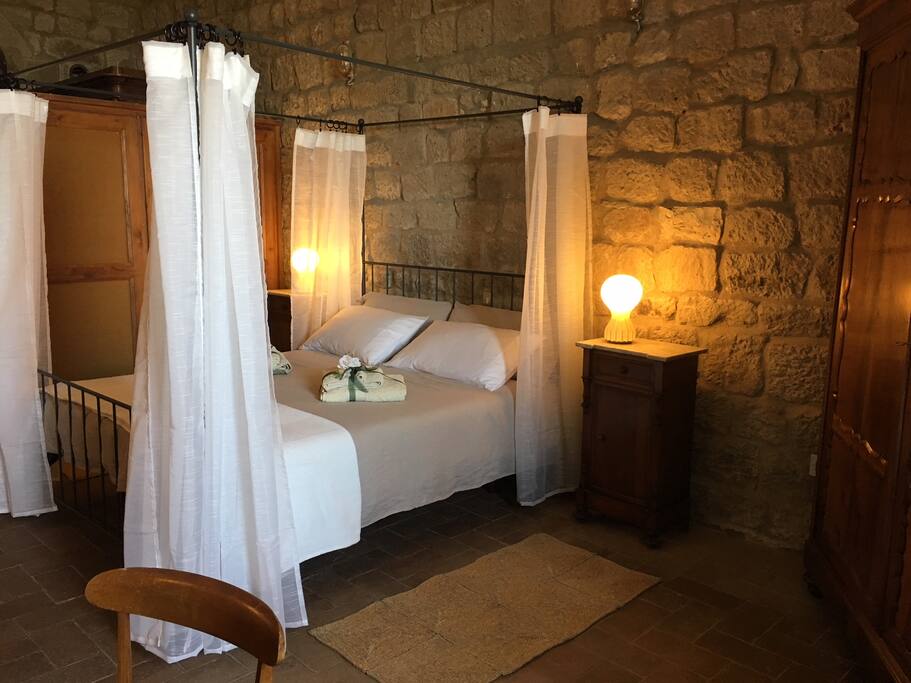 First floor bedroom with the canopy bed