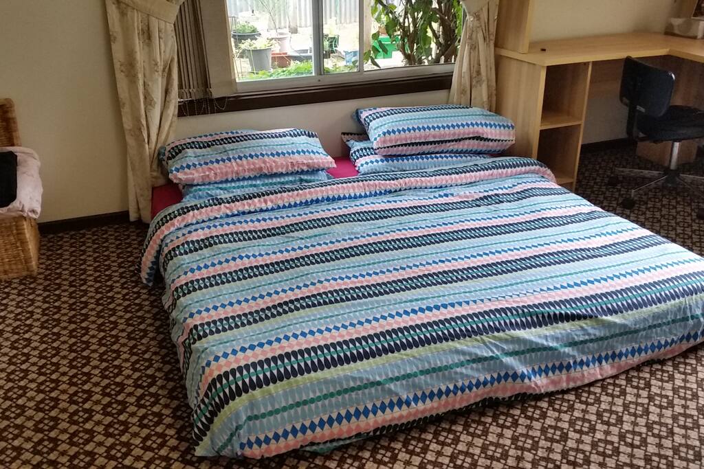 Large king sized bed. Note that this bed can also be separated into 2 single beds. Individual linens are also provided.