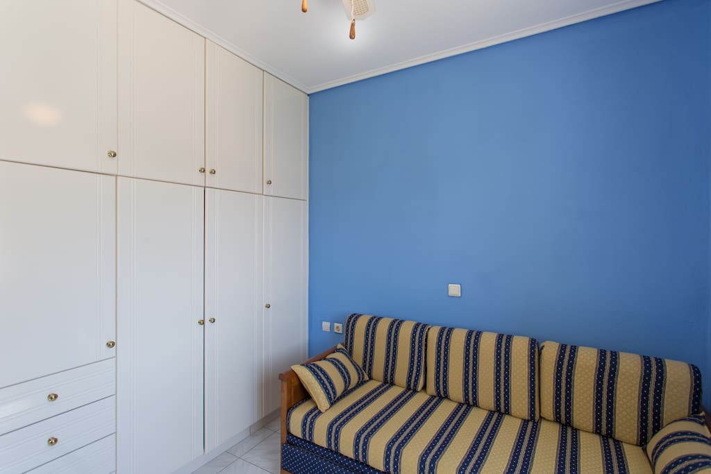 Bedroom with sofa bed.