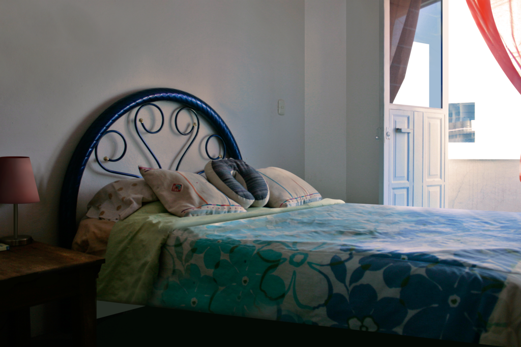 The bedroom with a little balcony