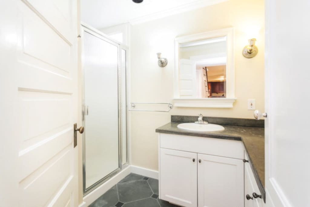 Private bathroom with shower and toiletries