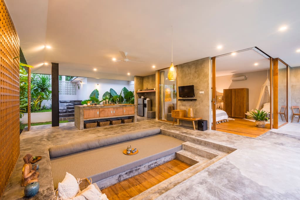 Spacious living room with sunken sofa