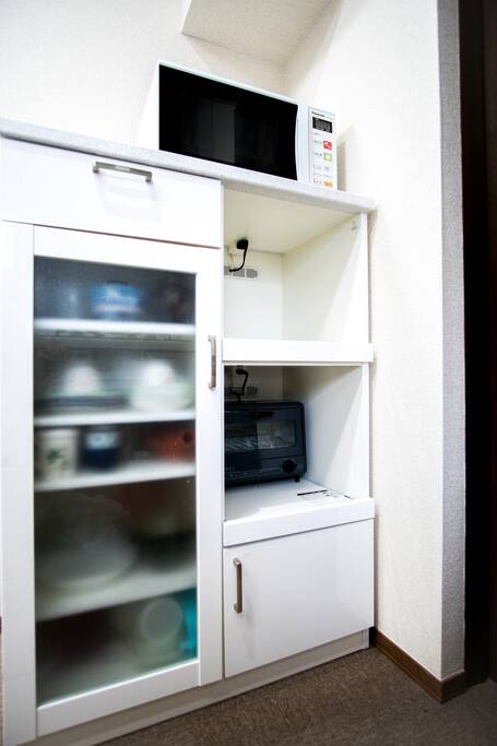 microwave, toaster and dishes