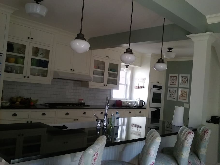 Gourmet / entertainer's dream kitchen. Gas 5 burner with high BTU, double electric wall ovens.