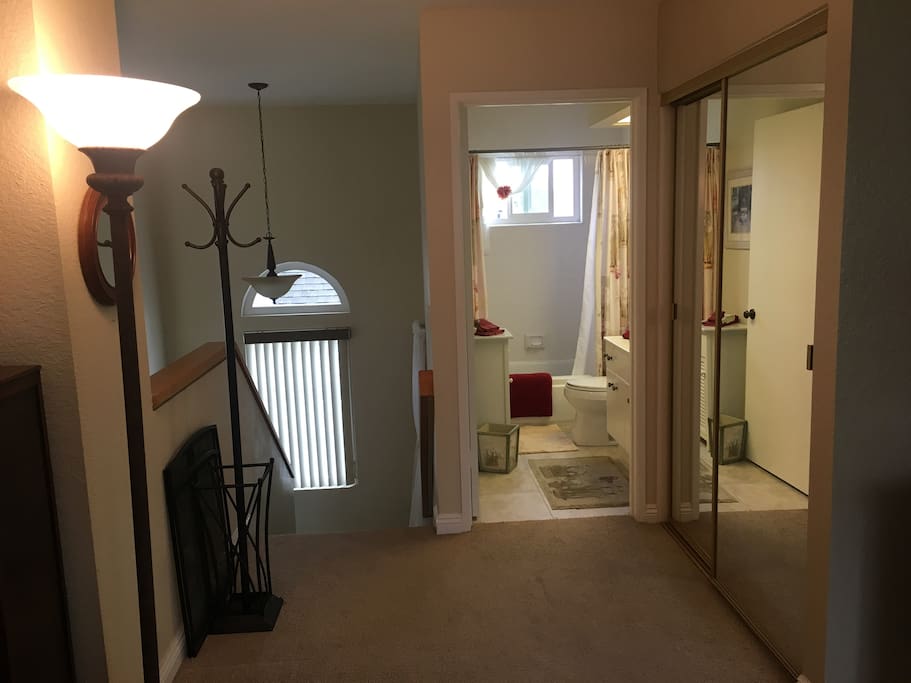 En suite bathroom & stairs down