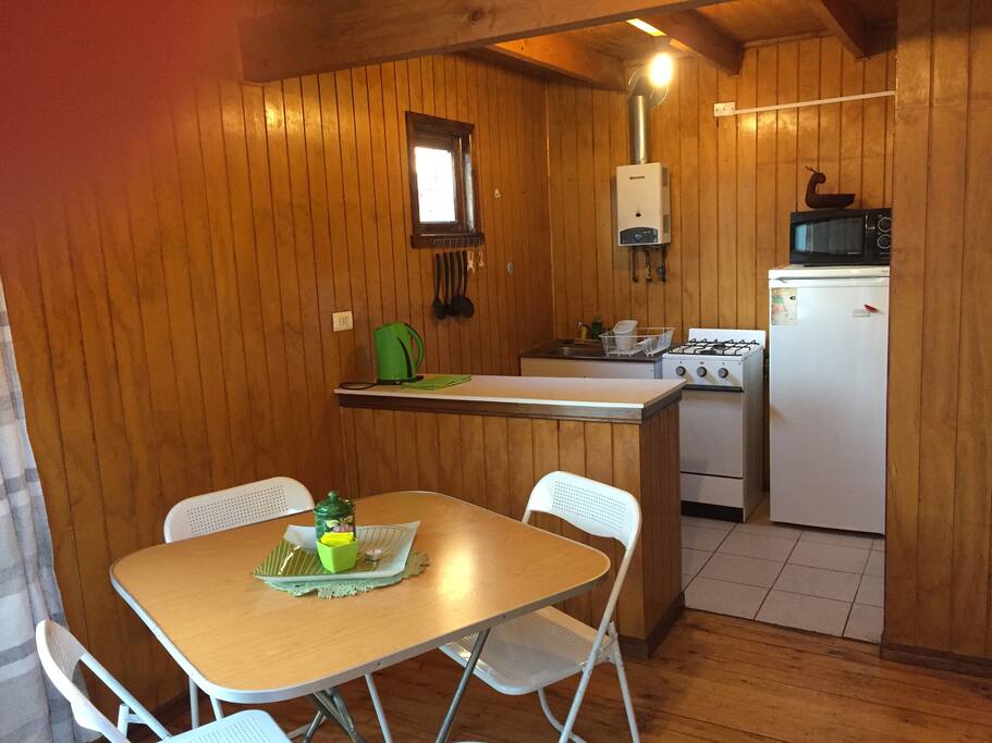 living comedor y cocina equipada.
