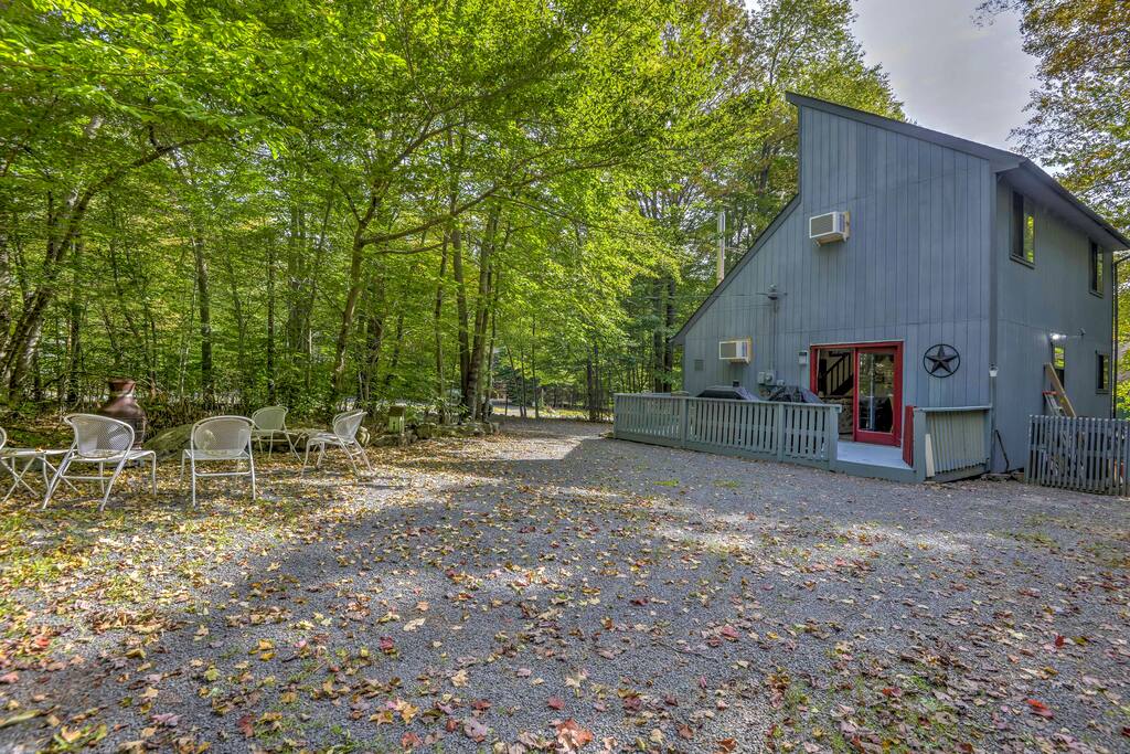 The home is nestled on a corner lot in a gated community, ensuring maximum privacy.