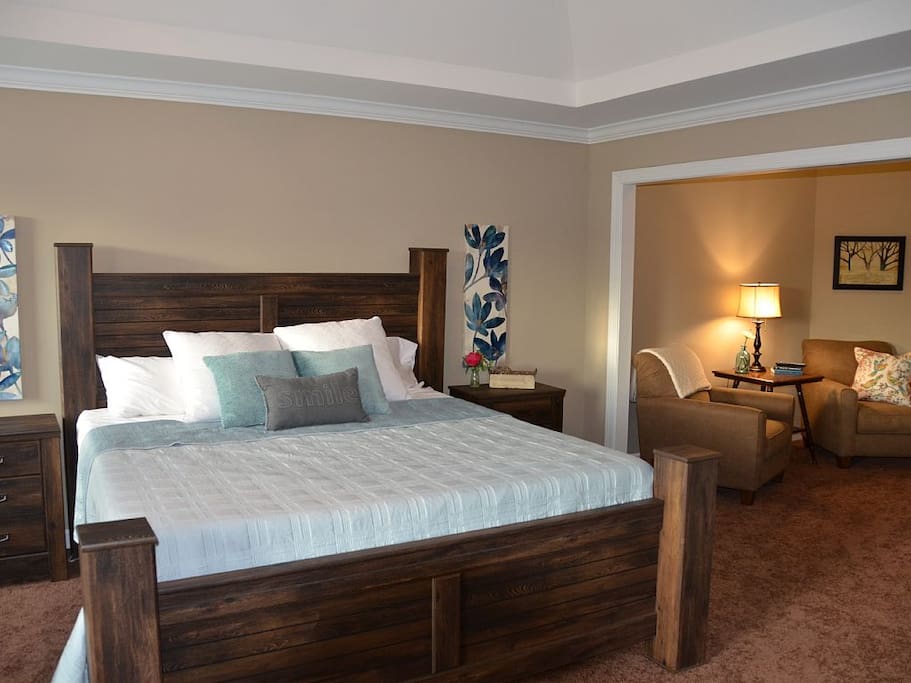 Master bedroom with king bed and attached sitting room with HD TV & Cable.
