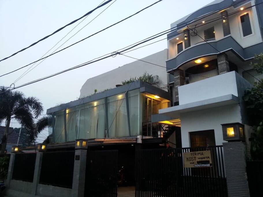 In front of the house