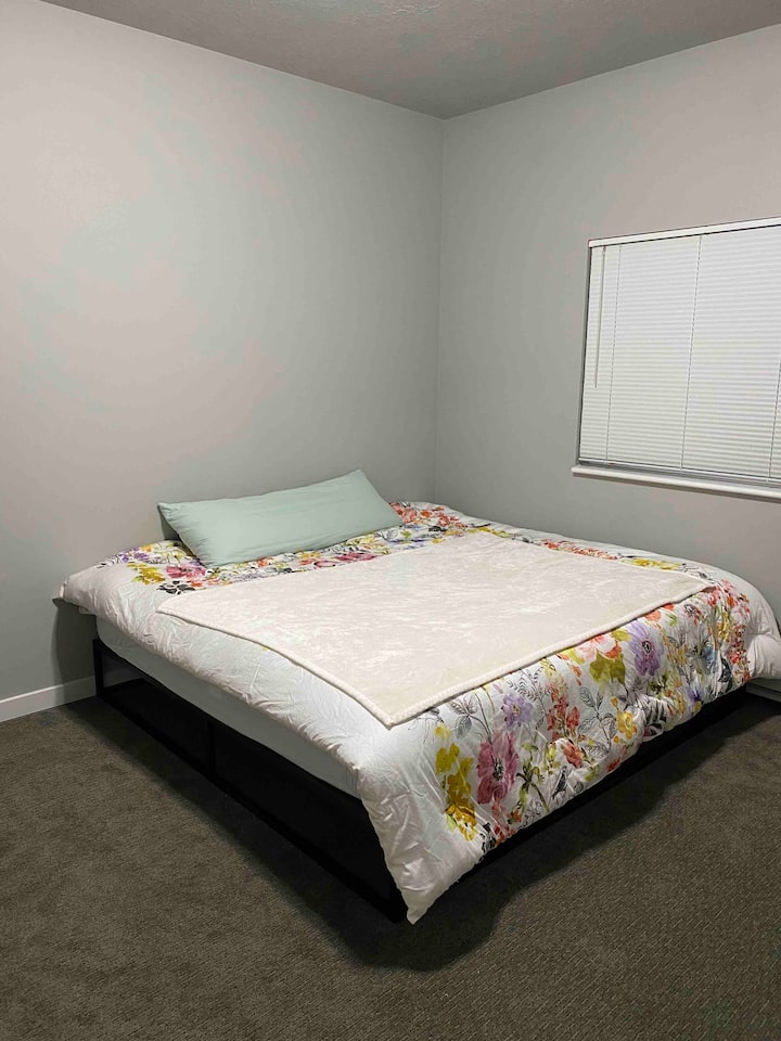 Bedroom with California king size bed and new mattress 