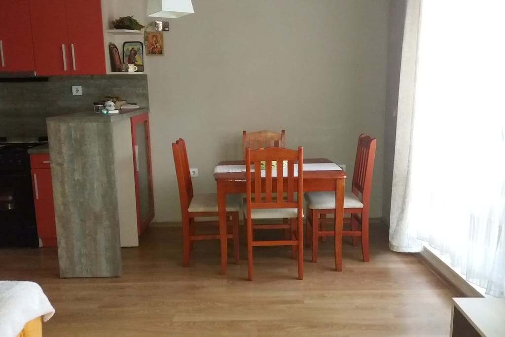 Comfortable dining table with four chairs