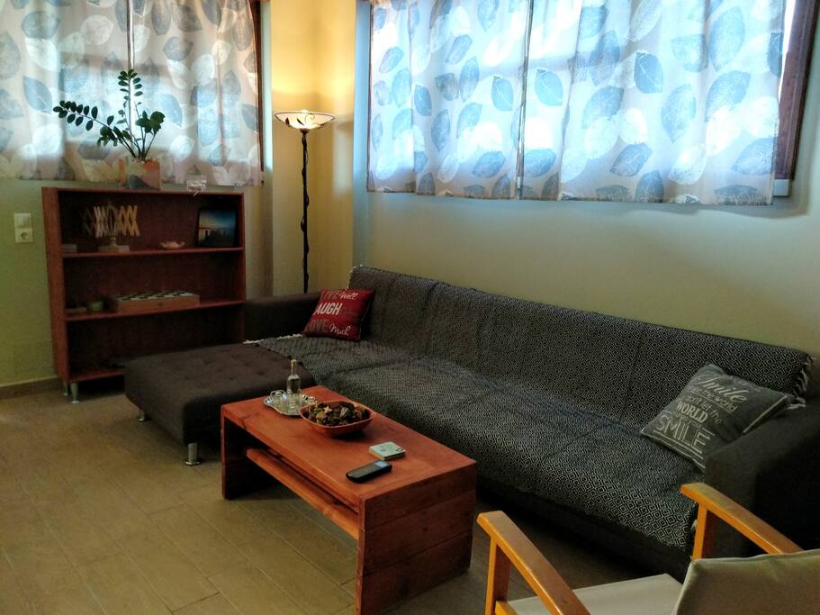 cozy livingroom with a large sofa-bed