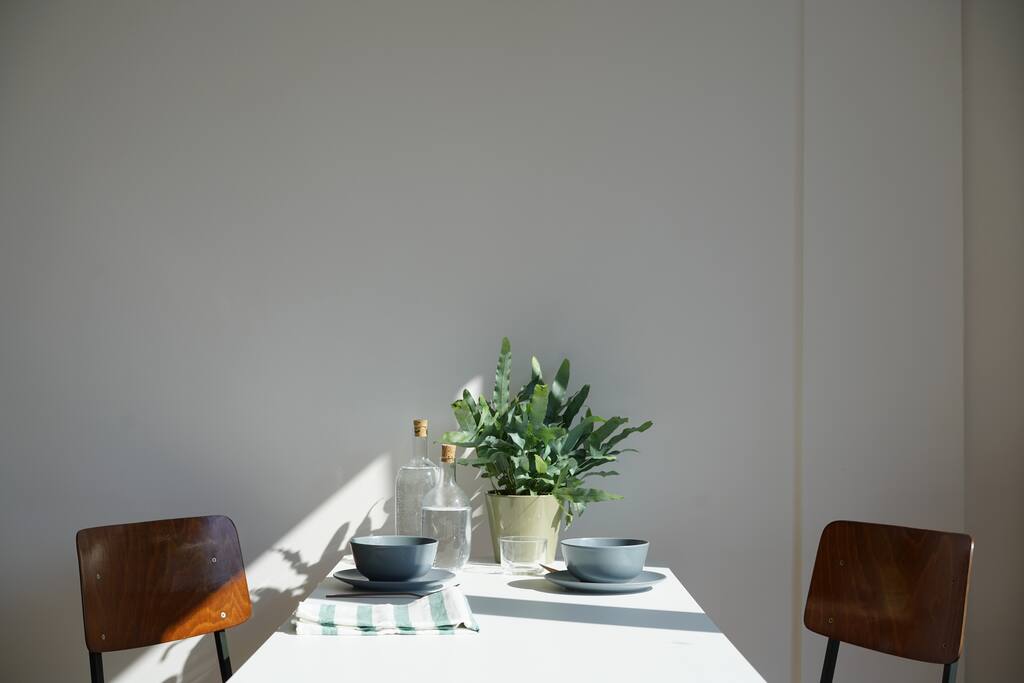 Have breakfast in the sun with a view over the city.