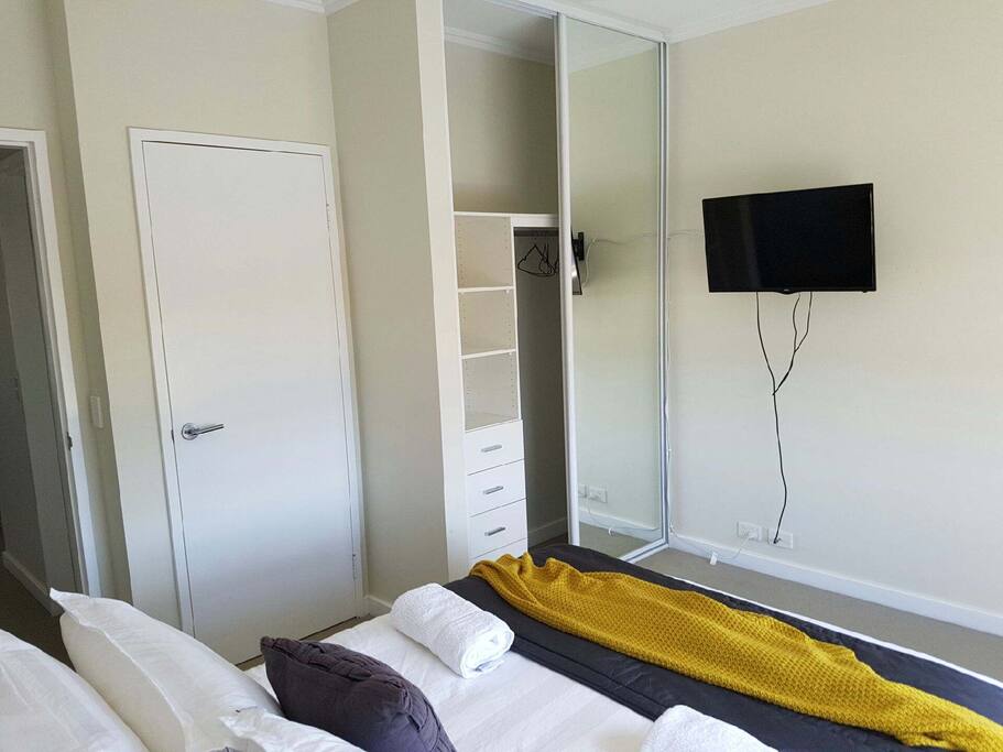 Each apartment has two bedrooms, that includes a queen bed and a TV.