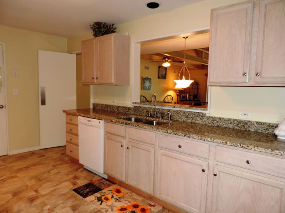 Large kitchen with granite counter tops