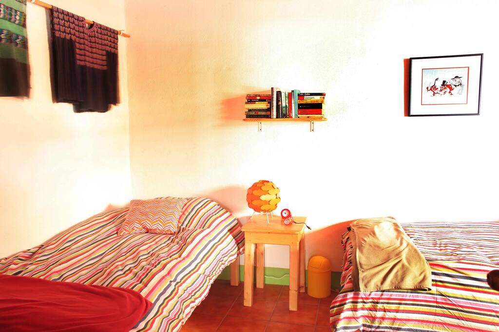 Comfy beds and local artwork.