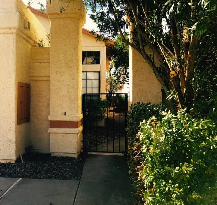 Private entry way leads to front door and fun backyard!