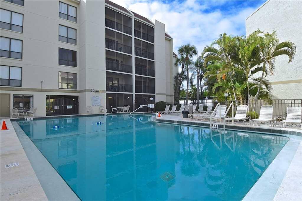 Pool View - Having the pool right outside your door makes getting out there to work on your tan so quick and convenient.