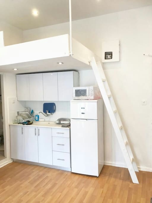 Upper level gallery double bed accessed by a ladder