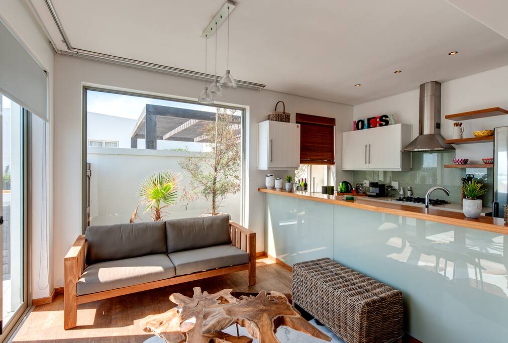 Another sitting area downstairs, and the modern kitchen