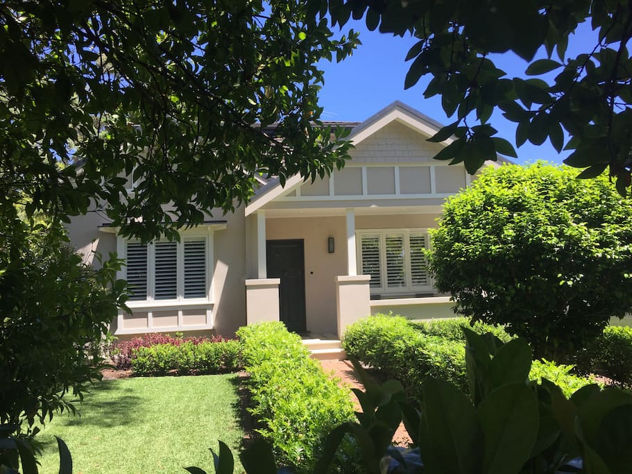 House front and garden. The period is a "Californian Bungalow" which is a popular style for the North Shore of Sydney