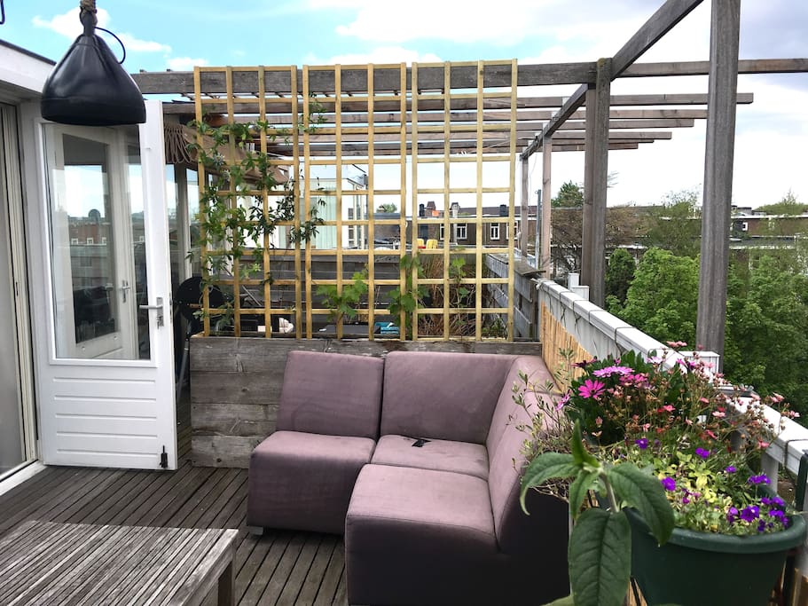 Design apartment with roof top terrace in center Design apartment with roof top terrace in center