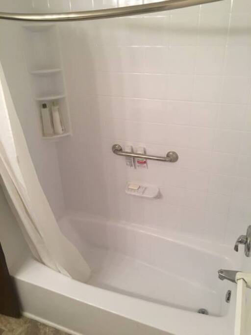 Bath tub and shower.