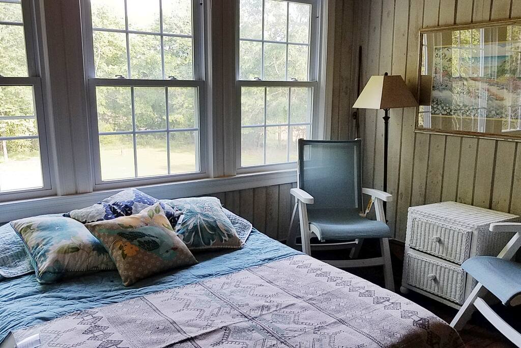Large rooms, 12-foot ceilings, and hardwood floors. All private, lock-out bedrooms are furnished country chic. Each bedroom has an adjoining private bath! Tenants share a laundry room, large kitchen, large den with central TV, large dining room/study space, and a large living room. All on 6 acres!