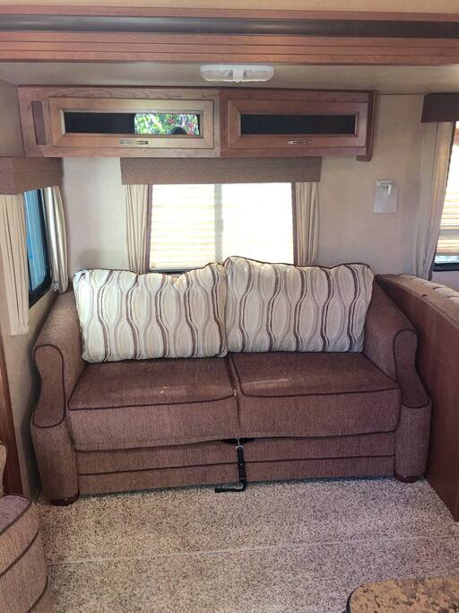 Sofa bed that has an air mattress that you blow up. Electric pump is provided.