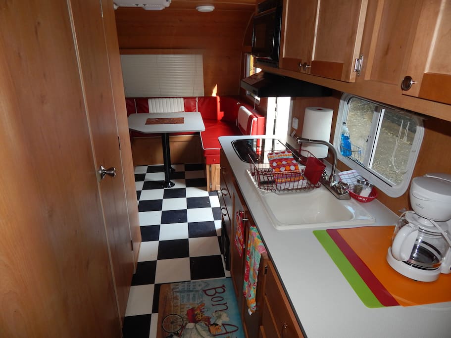 Kitchen counter and dinette table. Enjoy coffee (provided) in the morning.