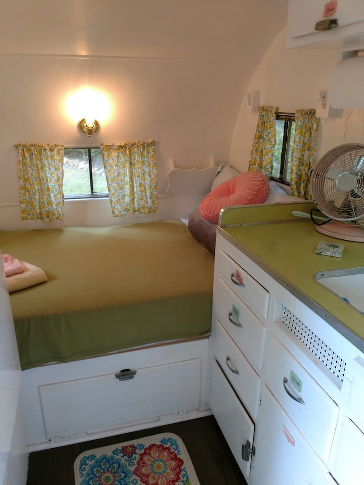 Comfortable full size bed, enjoy the night sounds that will lull you to sleep.
Air conditioning by mountain air, naturally, and a fan if you need a little extra air movement.