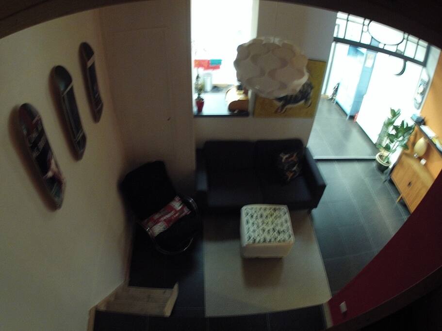 TV room , space for four . A x -box is present , not that you 'll need it with all the nice cafes in the neighborhood.