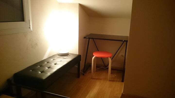 room Nr. 2 in the attic has a double bed and a working table!