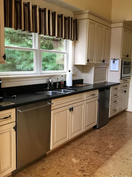 to the fully equipped kitchen . . .