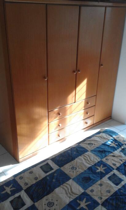 This was the most expensive wardrobe in the showroom. There are extra hangers at the back of the door.