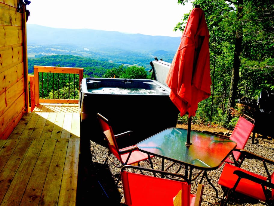 Hot tub, chairs, table & grill...all you need for a relaxing day outside