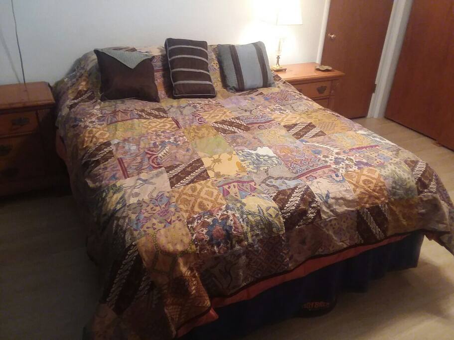 Queen size bed and nightstands.