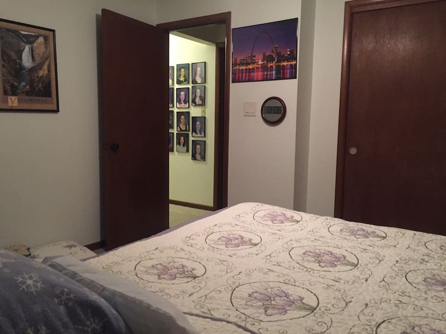 This is the view from the wall that has the window on it back towards the doorway. That is Yellowstone National Park on the left and The arch over St. Louis, Missouri on the right.