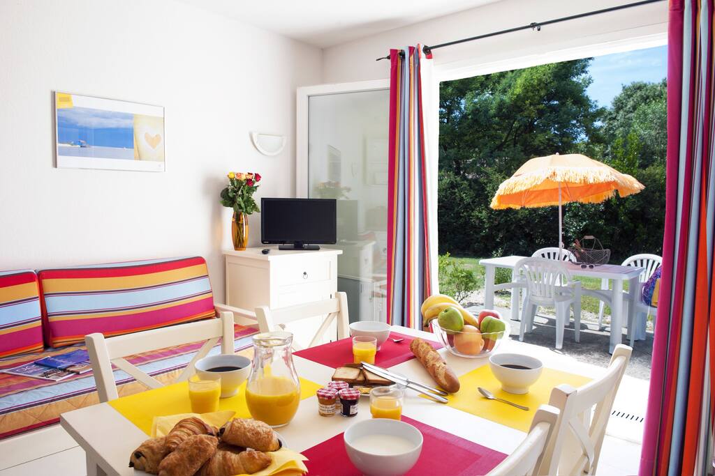 The living area is bright and cozy, perfect for relaxing after a wonderful day.