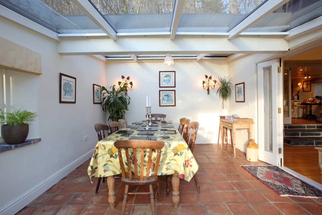The dining room table easily sits 10, 12 at a push.