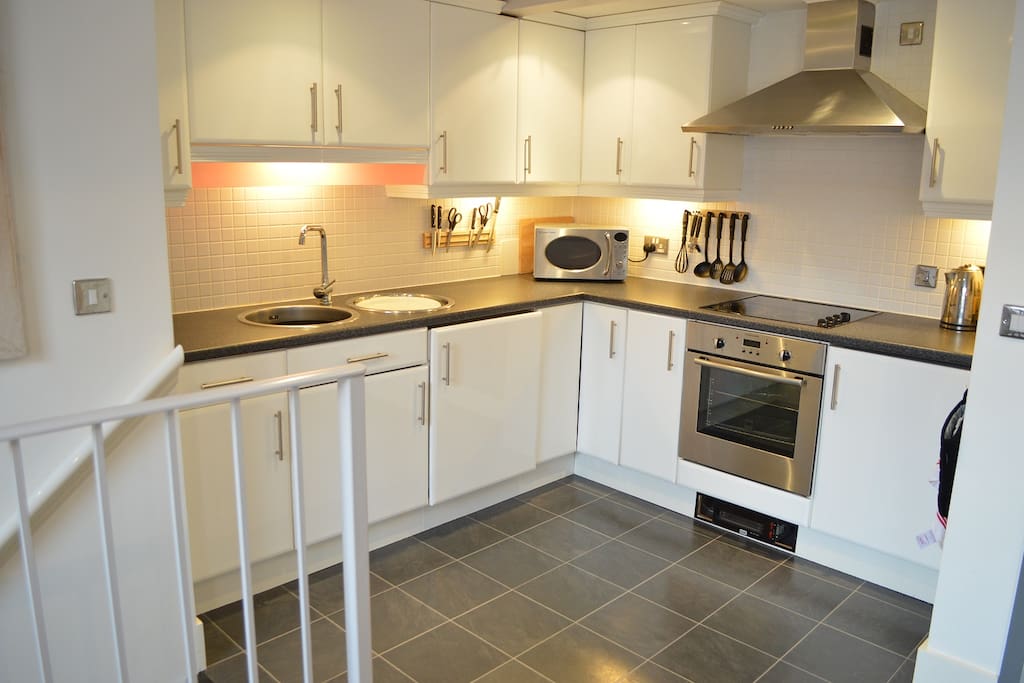 Kitchen - equipped with fridge, washing machine, microwave etc.