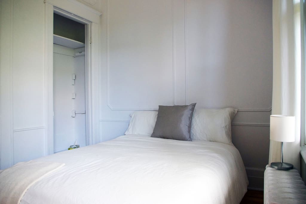 The double mattress is extremely comfortable and the long white curtains give you privacy