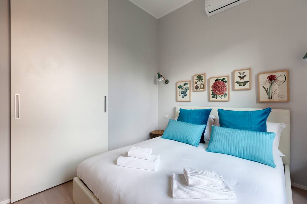 The Bedroom - The comfortable double bed with soft bed-linen and towels