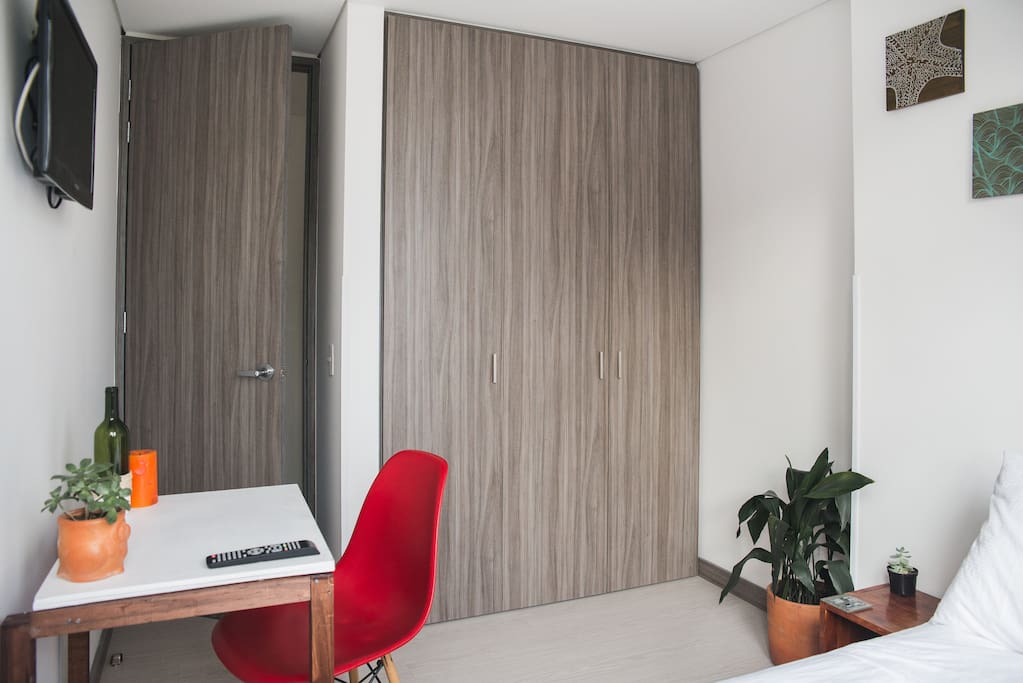 Behind that innocuous grey rectangle is lots of closet space.