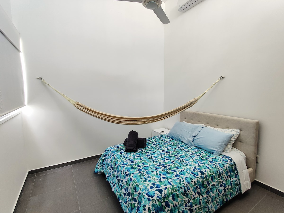 3rd bedroom, queen bed, hamock, A/c, ceiling fan, bathroom and closet